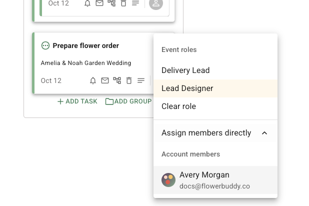 FlowerBuddy assignment menu next to the Prepare flower order task card, with Assign members directly expanded and Avery Morgan available under Account members below the Event roles.